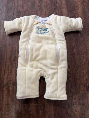Baby Merlin Sleepsuit New without tags. Large Cream